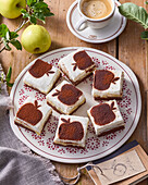 Apple pudding cake with cocoa decoration