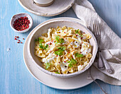 Farfalle Alfredo with cream, parsley and red pepper