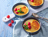 Crème brûlée with egg liqueur and fresh raspberries