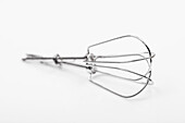 Stirring hooks of a mixer on a white background