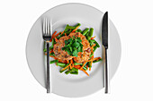Fishcake with green beans and carrot strips