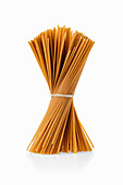 Bunch of dried bigoli pasta made from durum wheat semolina