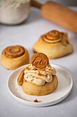 Lotus cinnamon buns with glaze and topping