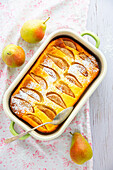Pear and curd cheese casserole with icing sugar
