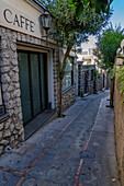 A narrow pedestrian street in the town of Capri, largest town on the island of Capri, Italy.