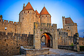 Entrance on ramparts at Carcassonne walls medieval castle fortress in France, popular touristic attraction, Europe