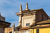 Statues on the Basilica of Santa Francesca Romana in the Forum in the Colosseum Archaeological Park. Rome, Italy.