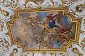 Fresco on the ornate carved coved ceiling of Room XI in the Palazzo Medici Riccardi, Florence, Italy. Entitled The Fine Arts Raised to Immortality by Anton Dominico Gabbiani.