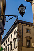 The Medici coat of arms on the Archbishop's Palace on the Piazza San Giovanni in Florence, Italy.