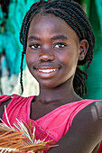 Portrait of a haitian nice girl in the plage de Ti Mouillage beach in Cayes-de-Jacmel, Cayes de Jacmel, Jacmel, Haiti.