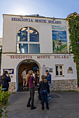 Tourists at the ticket office for the Monte Solaro chairlift in Anacapri on the island of Capri, Italy.