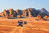 4x4 jeep vehicle tracks in Wadi Rum desert valley, Jordan, Middle East