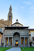 The campanile or bell tower & Pazzi Chapel in the cloisters of the Basilica of Santa Croce in Florence, Italy.