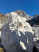 A sculpture roughed out with a CNC milling machine prior to hand finishing at a carving studio. Fantiscritti, Carrara, Italy. Behind are marble quarries in the Apuan Alpsl