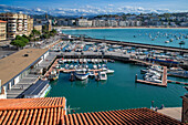 Fishing boats and sport fishing boats to recreational boat fishing are moored in the harbor of Donostia San Sebastian.