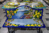 A ceramic bench with a lemon motif design & scene of Sorrento in the Campaniadamare shop in Sorrento, Italy.