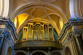 Organ pipes in the rear of the nave of the Church of San Francesco di'Assisi in Sorrento, Italy.