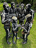 The Skeleton Men from the Omo Bugamo tribe of Papua New Guinea paint their bodies with black and white paint emulating the human skeleton, Chimbu Province, Papua New Guinea