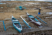 Local people and fisher boats in sipaway Island, San Carlos City, Negros Occidental, Philippines