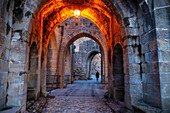 Entrance on ramparts at Carcassonne walls medieval castle fortress in France, popular touristic attraction, Europe