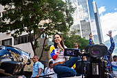 The leader of the opposition Maria Corina Machado, appears at the rally of the opposition called by her, in the streets of Caracas.