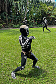 The Skeleton Men from the Omo Bugamo tribe of Papua New Guinea paint their bodies with black and white paint emulating the human skeleton, Chimbu Province, Papua New Guinea