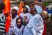 Haiti Voodoo Festival in Saut d'Eau, in Saut d'Eau, Ville Bonheur, Haiti. Thousands of both Vodou and Catholic followers gathered under the Saut d'Eau waterfall in Haiti. The pilgrimage, made by Voodou practitioners and Catholics alike, originated with the sighting of the likeness of the Virgin Mary on a palm leaf close to the falls half a century ago. Catholism and Voodou practices are forever intertwined in its Haitian form. The appearance of a rainbow beneath the falls is said indicate that Danbala - the great lord of the waterfall - and Ayida Wedo - the rainbow - are making love. Fertility