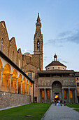 The campanile or bell tower & Pazzi Chapel in the cloisters of the Basilica of Santa Croce in Florence, Italy.