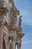 Detail of the Arch of Constantine, a triumphal arch in the Colosseum Archeological Park in Rome, Italy.