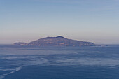 The island of Ischia in the Bay of Naples in the Tyrrhenian Sea. Italy. Viewed from the island of Capri.