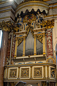 Organ pipes on the side of the nave of the Duomo of Amalfi, the Cathedral of St. Andrew, in Amalfi, Italy.