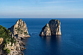 The Farallon Islands or faraglioni, sea stacks off the coast of the island of Capri, Italy.