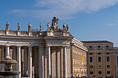 Statues on top of the portico around Saint Peter's Square in Vatican City in Rome, Italy.