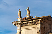 Statues on the Basilica of Santa Francesca Romana in the Forum in the Colosseum Archaeological Park. Rome, Italy.