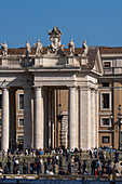 Statues on top of the portico around Saint Peter's Square in Vatican City in Rome, Italy.