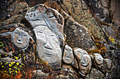 Sculpted rock artwork, part of the Stone and Man Exhibit,in the village of Qaqortoq, formerly Julianehåb, Greenland