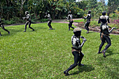 The Skeleton Men from the Omo Bugamo tribe of Papua New Guinea paint their bodies with black and white paint emulating the human skeleton, Chimbu Province, Papua New Guinea