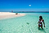 Tourists in a Isolated island uninhabited white sand beach, Île-à-Vache, Sud Province, Haiti