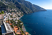 The seaside resort town of Positano terraced on the steep hillside of the Amalfi Coast in Italy.