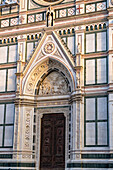 The main portal of the Basilica of Santa Croce or Basilica of the Holy Cross in Florence, Italy.