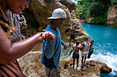 Exploring the cobalt waters of Bassin Bleu waterfall composed of bassin yes, bassin palmiste and bassin clair, Maire de Jacmel, Jacmel, Haiti