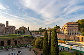 City of Rome and the Colosseum Archaeological Park, looking north from the Colosseum. The Temple of Venus and Roma & the Basilica of Santa Francesca Romana is at left.