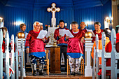 Inuit choir in traditional dresses, Nanortalik church Island of Qoornoq Province of Kitaa Southern Greenland Kingdom of Denmark Polar Regions