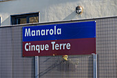 Sign at the train station for the Cinque Terre town of Manarola, Italy.