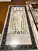 An unnamed medieval tomb in the floor of the Basilica of Santa Croce, Florence, Italy.