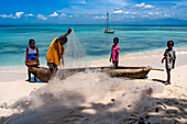 Fishermen with the catch of the day in Cayes-à-L’eau, a fishermen islet located northeast of Caye Grand Gosie, Île-à-Vache, Sud Province, Haiti