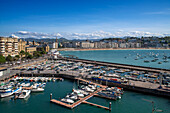 Fishing boats and sport fishing boats to recreational boat fishing are moored in the harbor of Donostia San Sebastian.