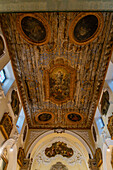 The painted ceiling of the nave of the Church of Santa Maria delle Grazie in Sorrento, Italy.