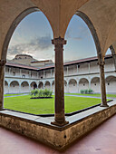 The arcade of the cloisters of the Basilica of Santa Croce in Florence, Italy.