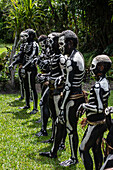 The Skeleton Men from the Omo Bugamo tribe of Papua New Guinea paint their bodies with black and white paint emulating the human skeleton, Chimbu Province, Papua New Guinea